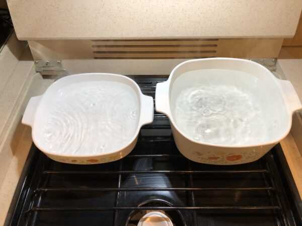 How to defrost an RV freezer - use pots of hot water
