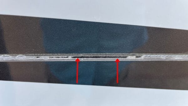 Missing and sloppy sealant on an RV slide rom
