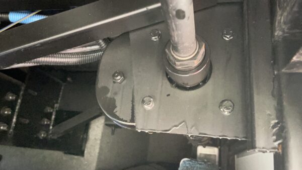Electric through-the-frame rack and pinion slide system