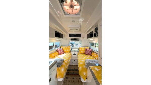 Inside an Oliver RV facing toward the rear