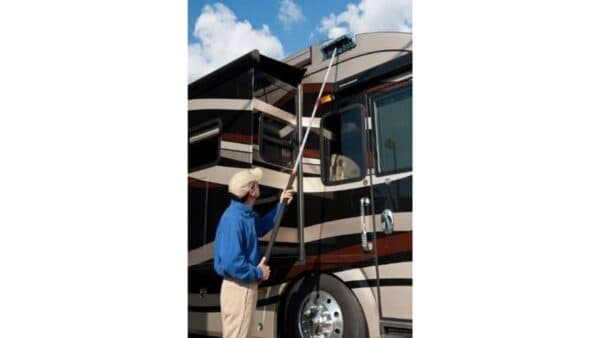 Using the Wash Wax All pole system to clean an RV
