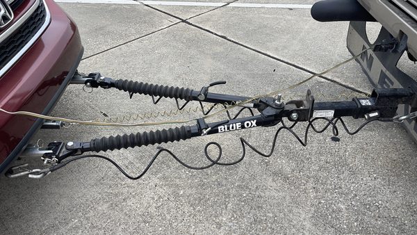 The base plate is what connects the towed vehicle to the tow bar.